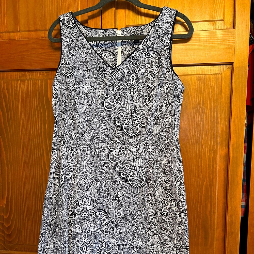 Tommy size 14 navy and white paisley print with pretty trim detail. Worn once.